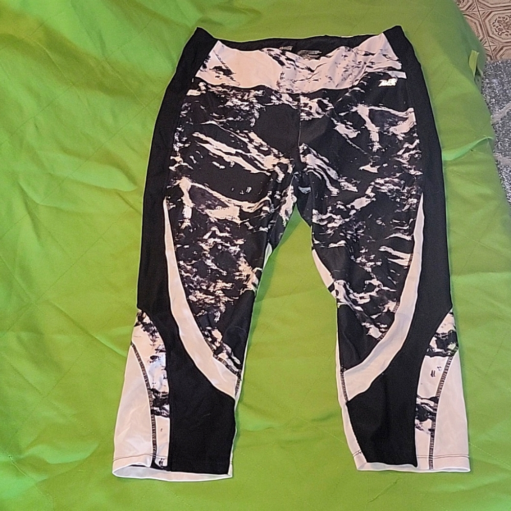 Used size XL black and white marbled Avia leggings.